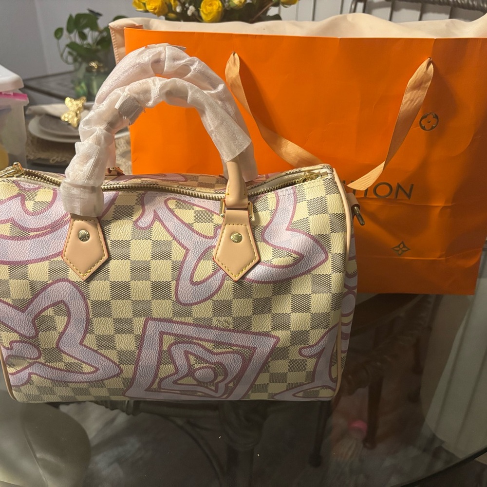 Elegant Checkered Satchel with Pink Details